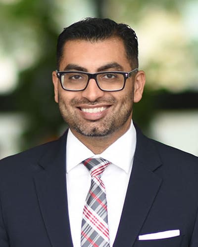 Simon Aziz Budhwani, Esq., founder of All Star Injury Attorneys